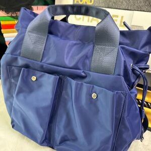 Chico's nylon travel bag, specifically a versatile piece designed for overnight